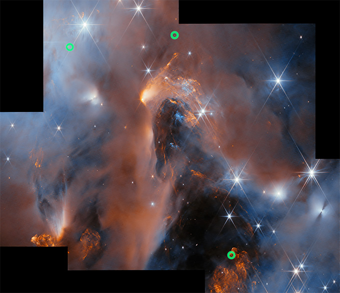 Gas and dust swirl, and stars twinkle, in an image of a stellar nursery. Some of the starlike objects captured in this image are baby planets, researchers say.